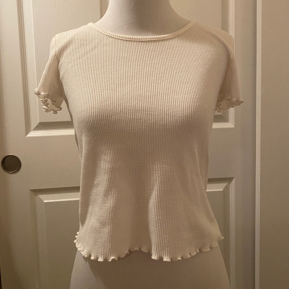 Tilly’s white blouse